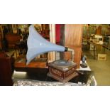 A horn gramophone with unusual blue horn.