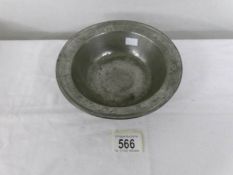 A 19th century pewter dish.