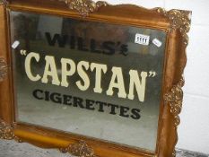 A Will's Capstan cigarettes advertising mirror.