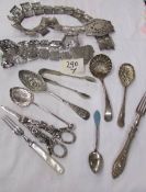 2 metal belts, cutlery etc.