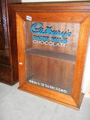 A 'Cadbury's Chocolate' advertising cabinet.