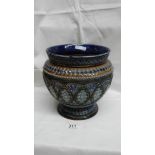 A heavily patterned Doulton Lambeth 1882 bulbous vase in blue, green,