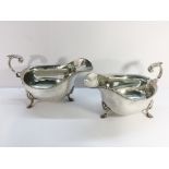 A pair of silver sauce boats, approximately 490 grams.
