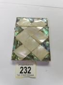 A Victorian mother of pearl and abalone card case.