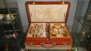 A London silver vanity set including crocodile skin case