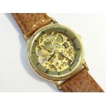 A gent's gold plated Accurist wind up skeleton watch, in very good condition.