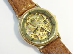 A gent's gold plated Accurist wind up skeleton watch, in very good condition.