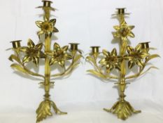 A pair of ormolu gilded brass floral candelabra