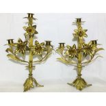 A pair of ormolu gilded brass floral candelabra