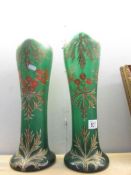 A pair of 19th century hand painted green glass vases with red and gold holly pattern, 16" tall.
