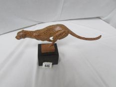 A rare bronze patterned cheetah, signed, approximate length 33 cm.