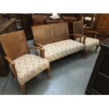 A good quality bergere three piece suite.