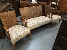 A good quality bergere three piece suite.