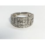 An 18ct gold and diamond set Greek Key abstract design ring set with approximately 50 diamonds,