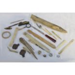 A quantity of bone items including crochet hooks, page turners etc.