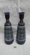 A pair of Doulton Lambeth 1878 vases, Harriet E Hibbut and Louisa Matterson.