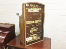 An unusual advertising hardware cabinet & till