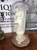 A marble figure of a semi nude lady A/F under glass dome.