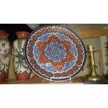 A large hand painted gold imari patterned oriental charger