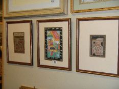3 framed and glazed Arabic 'storm' panels.