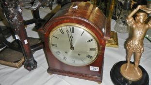 An oak bracket clock with key & pendulum