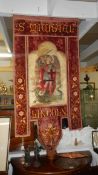 An antique religious banner 'St. Michael, Lincoln'.