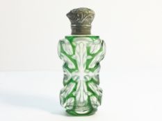 A 19th century glass scent bottle with stopper (lid a/f).