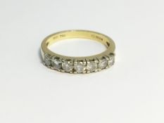 An 18ct yellow gold 7 stone diamond bar ring, 3.6 grams, size M.