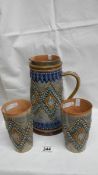 A Doulton Lambeth jug 1883 with intricate raised pastel blue,