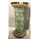 A large Doulton Lambeth patent jardiniere stand with several marks underneath including 'dd'