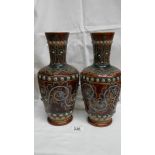 A pair of 1875 Doulton Lambeth vases by George Tinworth (monogram on side of each vase) with