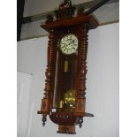 A Victorian mahogany double regulator wall clock.
