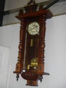 A Victorian mahogany double regulator wall clock.