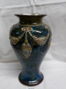 A Royal Doulton vase with several markings underneath (one possibly of E Violet Hayward),