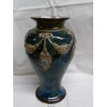 A Royal Doulton vase with several markings underneath (one possibly of E Violet Hayward),