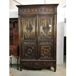 A French carved armoire.