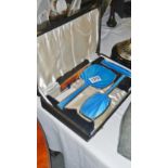 A silver enamel dressing table set