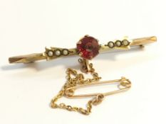A 1920's 9ct gold brooch set seed pearls.
