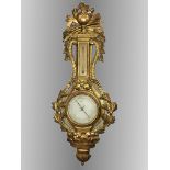 An 18th century gilt wall barometer 'Rue St Honore Au Mont-D'or A Paris