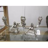 A pair of sterling silver candelabra.