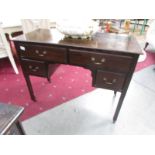 A Victorian mahogany 4 drawer writing desk.