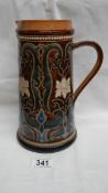 A Doulton Lambeth 1878 jug with stylised floral and leaves pattern in blue,