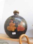 A large hand painted metal oriental flask.