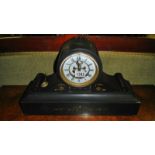 A 19th century black slate mantle clock