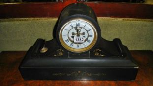 A 19th century black slate mantle clock
