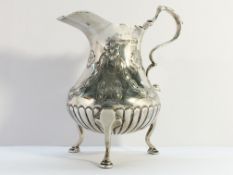 A silver cream jug, M.J.J Birmingham 1908.