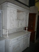 A white painted bookcase.