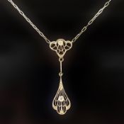 An Art Nouveau Diamond pendant.