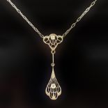 An Art Nouveau Diamond pendant.