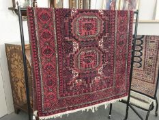 A red ground rug.